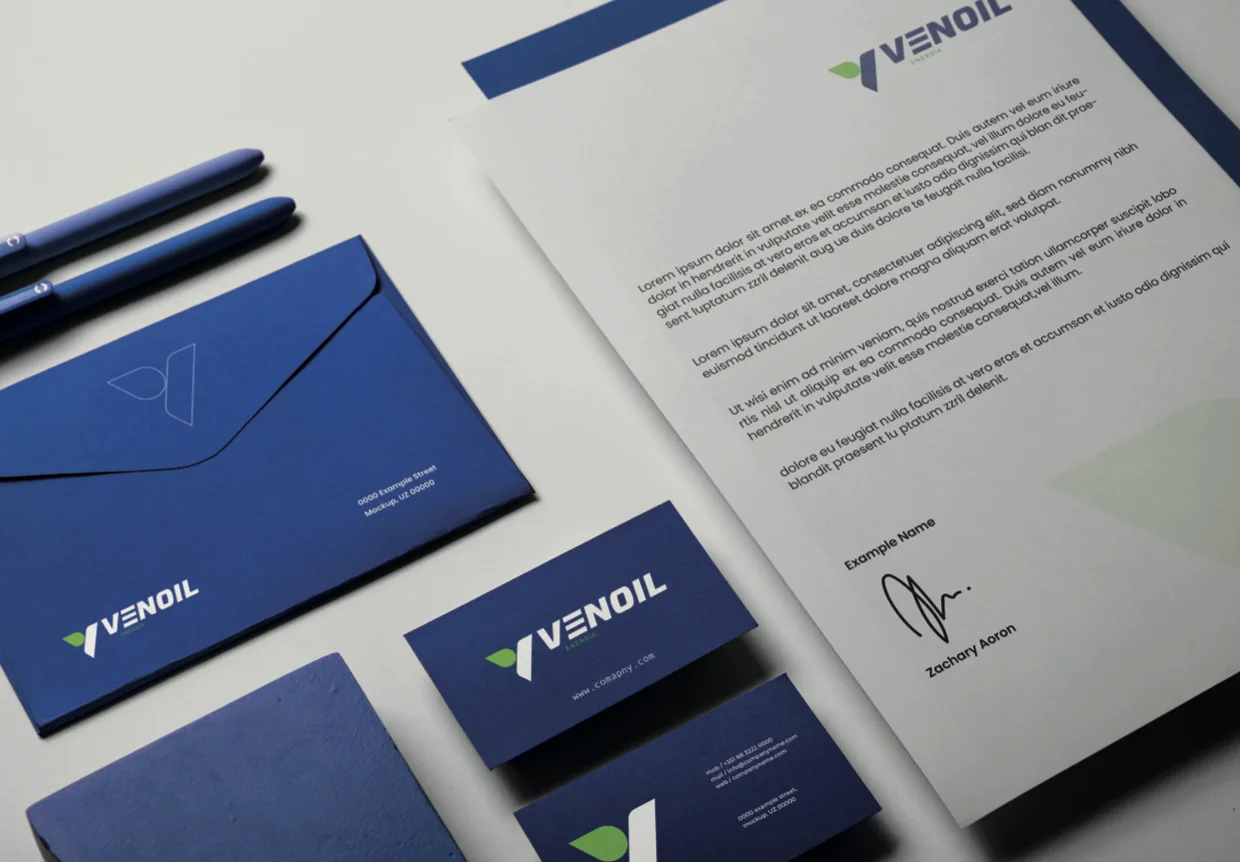 Sistema de papelería Venoil — sobres, tarjetas y membrete en azul